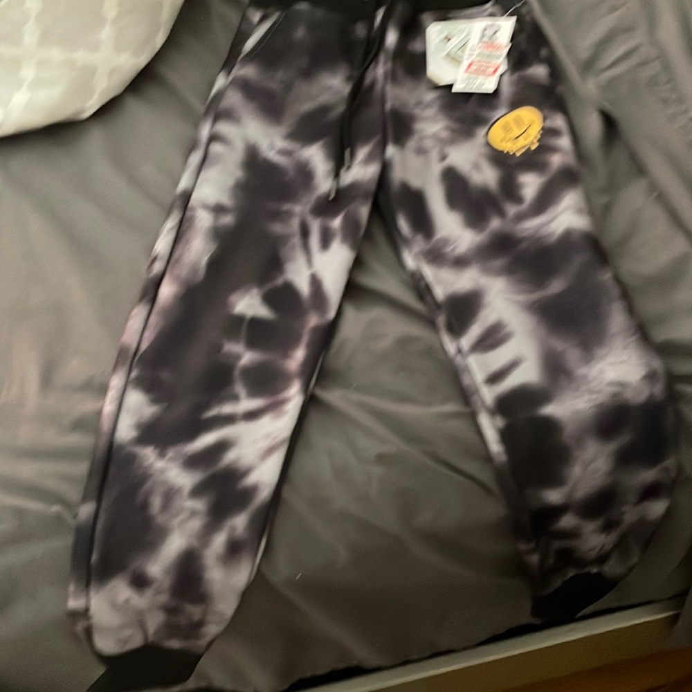 The pants are a kid size black and gray Jogging pants